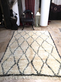 Vintage moroccan beni ouarain rug